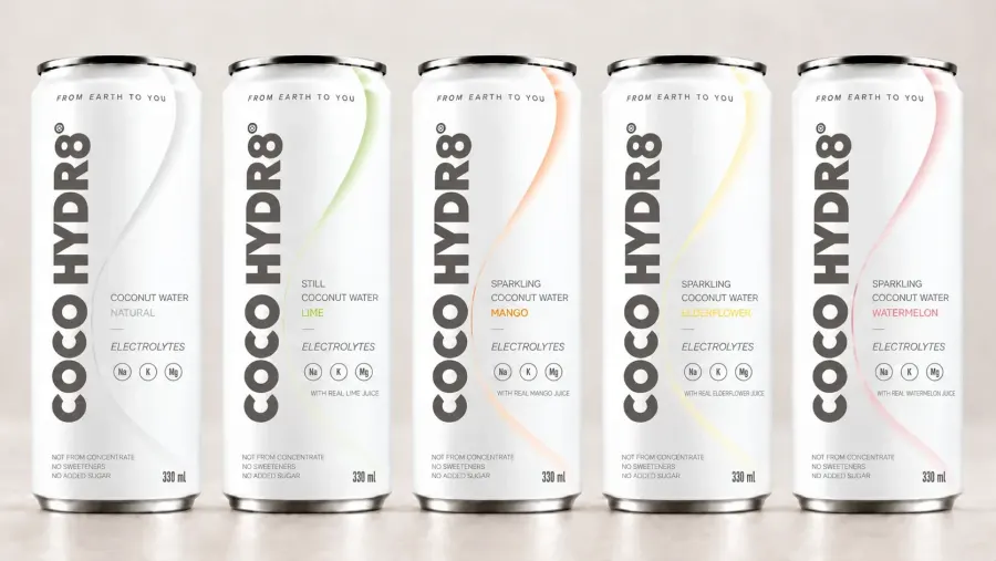 All five COCO HYDR8 cans side by side: Natural, Lime, Mango, Elderflower and Watermelon