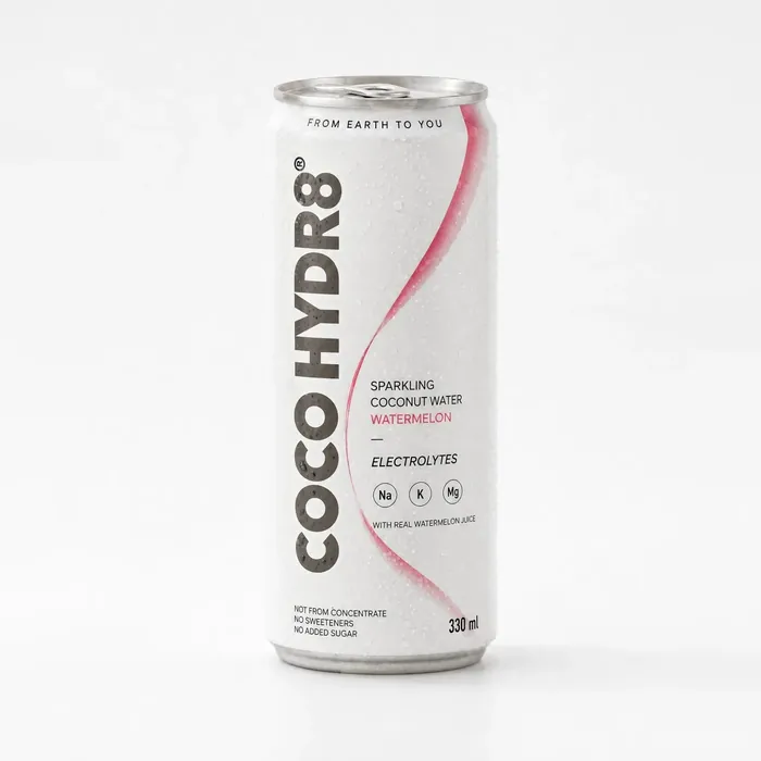 A chilled can of COCO HYDR8 Watermelon, beaded with condensation, on a pale studio backdrop
